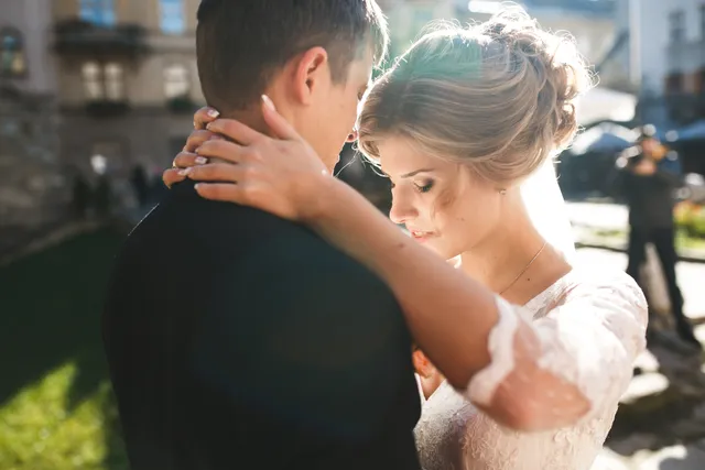 A couple embracing while they dance