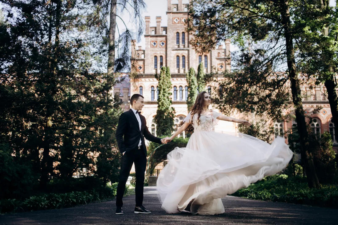 A couple walking through an estate alley