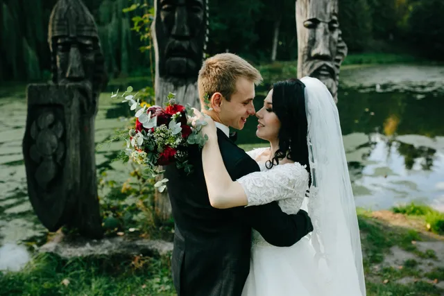 A newlywed couple in a park